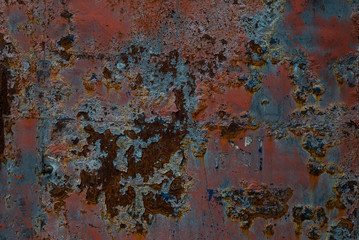 A metal wall corroded by rust. Abstract background.