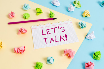 Text sign showing Let S Is Talk. Business photo text suggesting in the beginning of a conversation on the topic Colored crumpled papers empty reminder blue yellow background clothespin