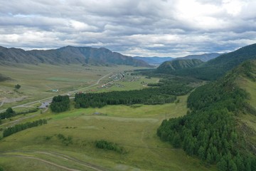 Fototapeta na wymiar mountains before the rain, Tuekt village, Ongudaysky district, Altai Republic, Russia, summer month August