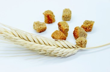 Rye crackers and rye spike located on a white background