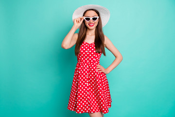 Fototapeta premium Portrait of her she nice-looking attractive lovely pretty cheerful peaceful dreamy straight-haired girl touching specs rest relax isolated over green blue turquoise bright vivid shine background