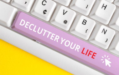 Writing note showing De Clutter Your Life. Business concept for remove unnecessary items from...