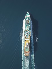 Aerial view large cruise ship at sea, Passenger cruise ship vessel, sailing across the Ksamil,...