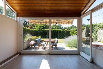 Covered veranda with access to the private garden