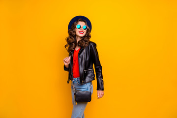 Obraz premium Photo of attractive lady walking down paris streets ready for shopping time wear stylish outfit with shoulder clutch isolated yellow background