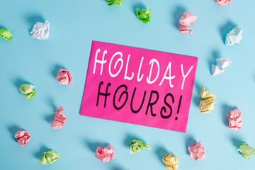 Writing note showing Holiday Hours. Business concept for Overtime work on for employees under...
