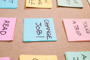 new year goals or resolutions - colorful sticky notes on a Notepad