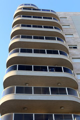 The balcony in architecture is a platform with a railing, mounted on beams protruding from the wall.