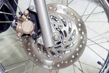 Fototapeta premium Close-up of a disc brake on a motorcycle.