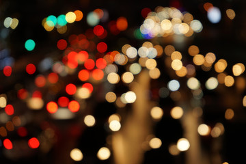 Fototapeta premium colourful bokeh in black background,city night,space flare,blurry traffic background