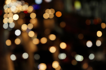 colourful yellow bokeh in black background,city night,space flare,blurry traffic background