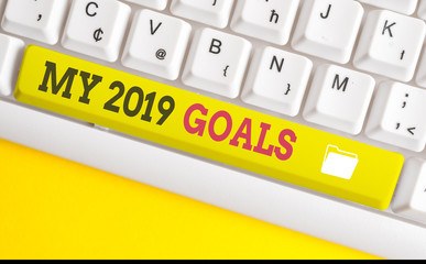 Text sign showing My 2019 Goals. Business photo text setting up demonstratingal goals or plans for the current year White pc keyboard with empty note paper above white background key copy space