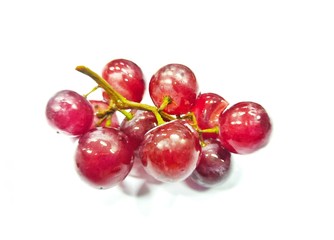 Red grapes on a white background 