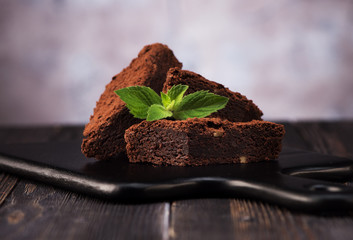 Browns truffle chocolate cake on a dark background