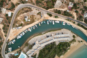 Boats in the sea harbor. Top down aerial view