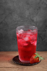 strawberry cocktail and strawberry on wooden table with a blank space for a text, Fruit in kitchen background