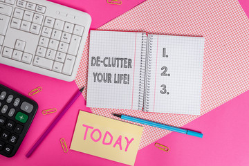 Writing note showing De Clutter Your Life. Business concept for remove unnecessary items from...