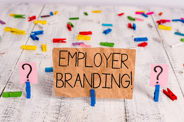 Text sign showing Employer Branding. Business photo text promoting company employer choice to desired target group Scribbled and crumbling sheet with paper clips placed on the wooden table