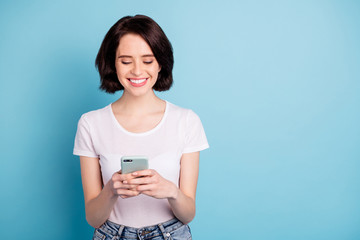 Portrait of her she nice attractive lovely cheerful focused girl using wireless connection internet...