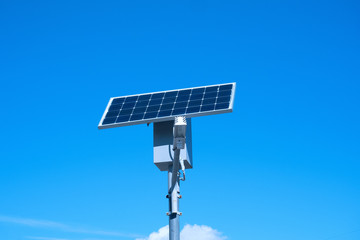 Solar panel and street lamp.