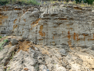 the steep bank, sandstone outcrops in the shallow Baltic Sea coast, Zelenogradsk, Russia