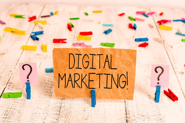 Text sign showing Digital Marketing. Business photo text market products or services using technologies on Internet Scribbled and crumbling sheet with paper clips placed on the wooden table