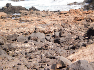 Fototapeta na wymiar Wonderful Volcanic Formations Next To The Sea In Costa Teguise. June 30, 2011. Costa Teguise Lanzarote Spain Europe. Travel tourism street photography.
