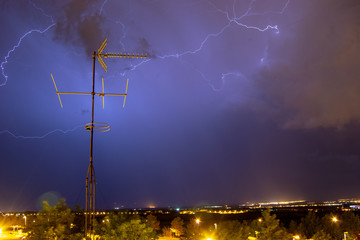 Storm at night in Zaragoza lights
