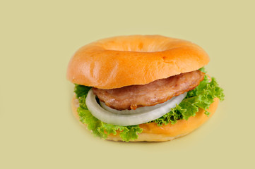 fresh tasty burger isolated on yellow background