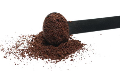 Milled coffee powder for espresso isolated on white background
