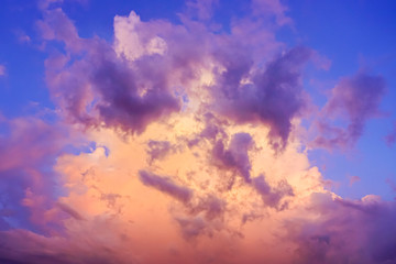 Fototapeta na wymiar blurred photo of cloud and sunset sky,vintage color filter tone.