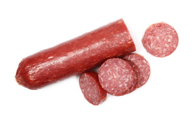 Fermented semi-dry, smoked sausage salami slices isolated on white background, top view