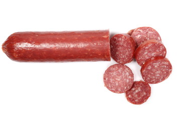 Fermented semi-dry, smoked sausage salami slices isolated on white background, top view