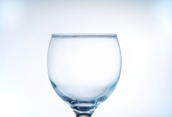 Empty wine glass on a white background, isolated, close up