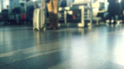 Defocusing. Busy Airport Terminal. Traveler at airport 