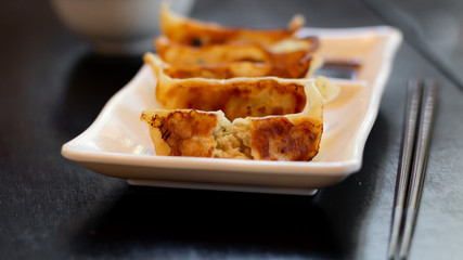 Japanese gyoza or dumplings snack with soy sauce