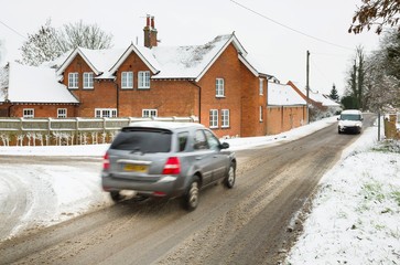 Cars driving in winter snow UK