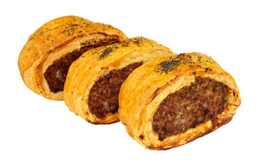 Pork and black pudding savoury sausage rolls isolated on a white background