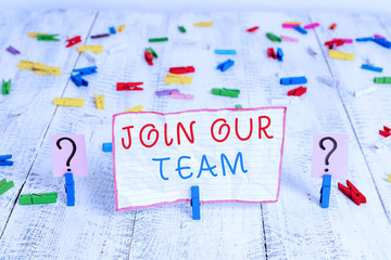 Handwriting text writing Join Our Team. Conceptual photo inviting someone to join in your local group or company Scribbled and crumbling sheet with paper clips placed on the wooden table