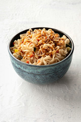 Instant ramen noodles with carrot and a sauce