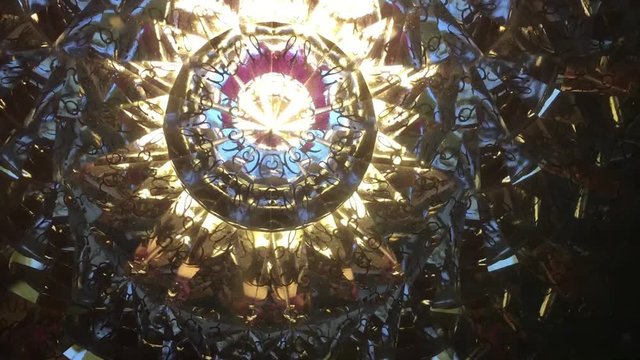 Abstract background, real video shooting done with kaleidoscope. Elegant background. Asymmetrical. Real view. 	