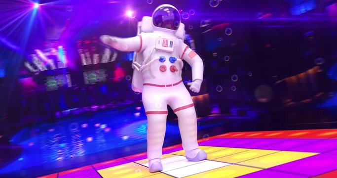 Astronaut Dancing On A Disco Stage With Foams Falling - Camera Moving Around Him - Lights And Cool Ambient Seamless Loop