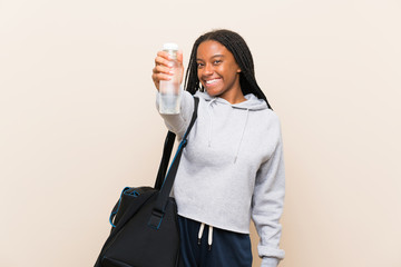 African American sport teenager girl with long braided hair