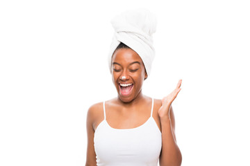 African American teenager girl with moisturizer over isolated white background