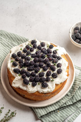 Fresh cakes with blackberries and cream cheese