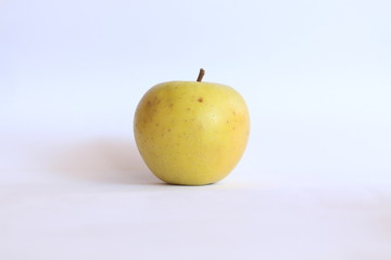 Delicious Crunchy Spotted Fresh Green Apple Isolated On White Background