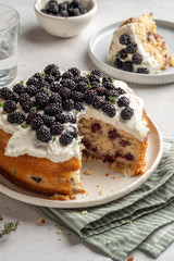 Fresh cakes with blackberries and cream cheese