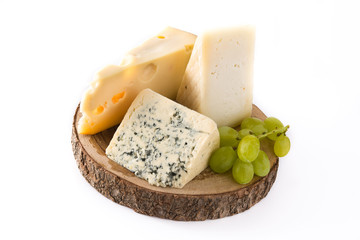 Different types of cheeses and green grapes isolated on white background