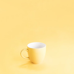 Still life of a yellow mug