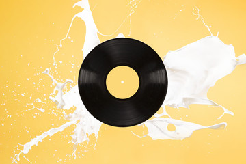 Vinyl background with spilling liquid